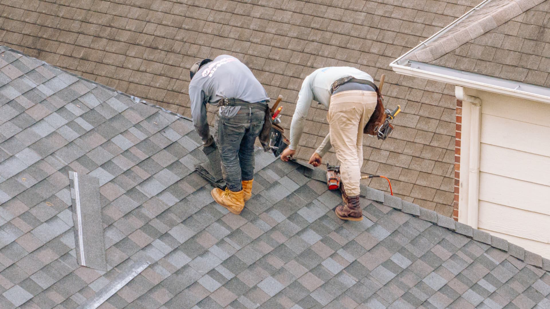 Houston home roofline with new roof and gutter edge from above